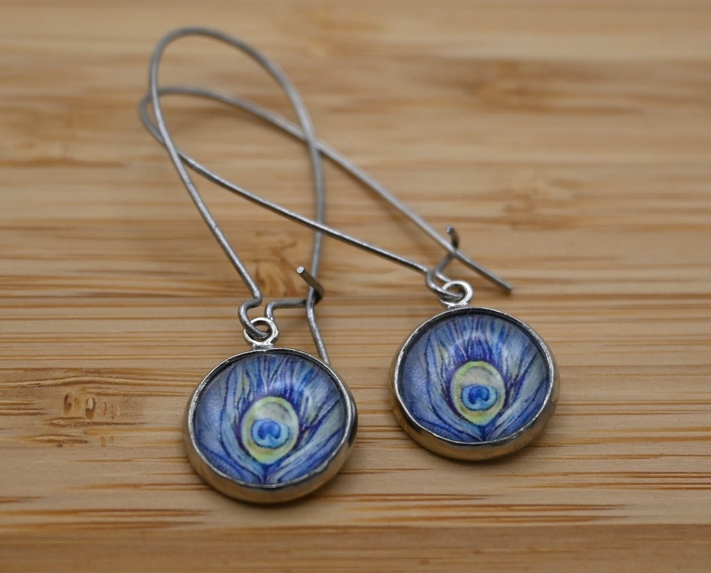 [IVO007] Oorbellen Pauwenveer blauw